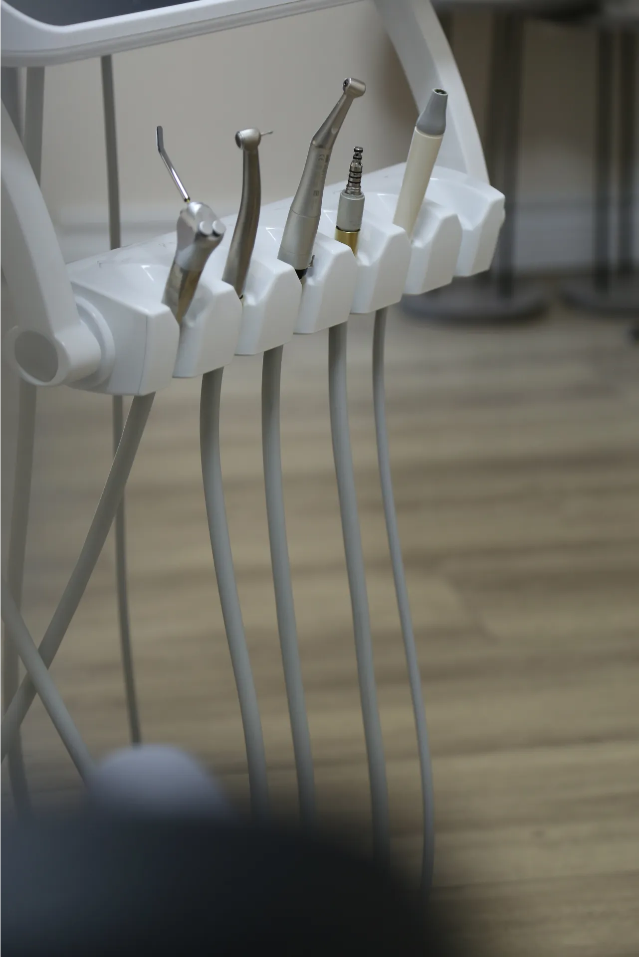 Dental handpieces at a treatment unit